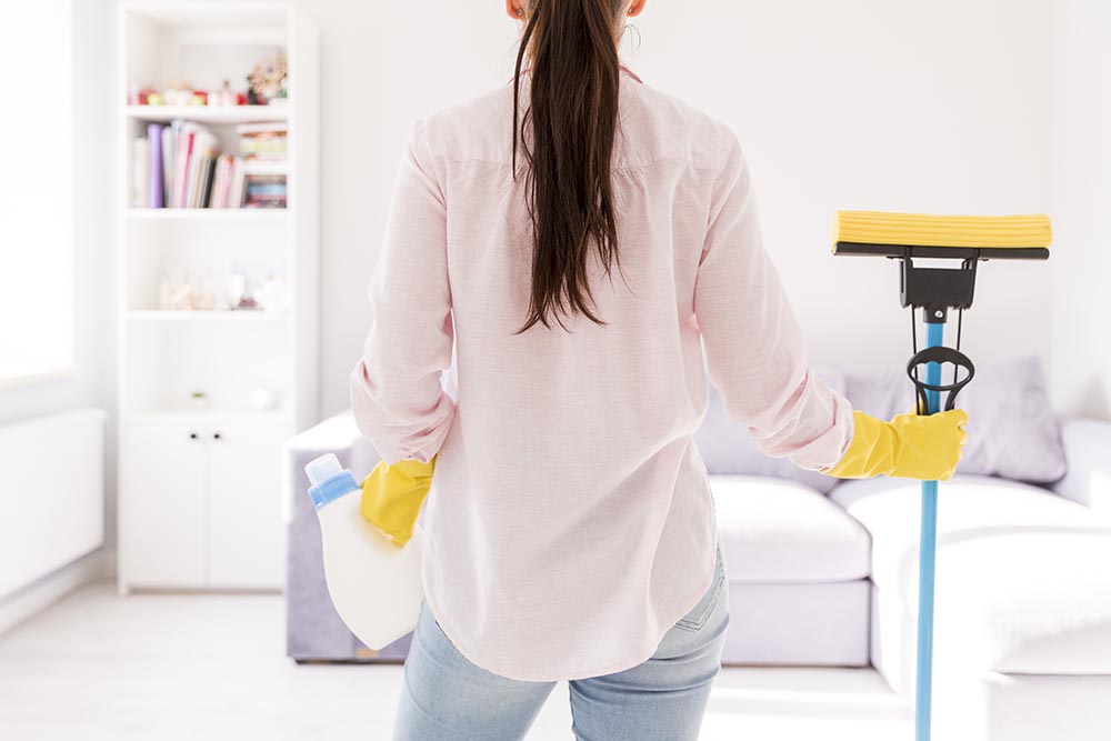 woman cleaning her home