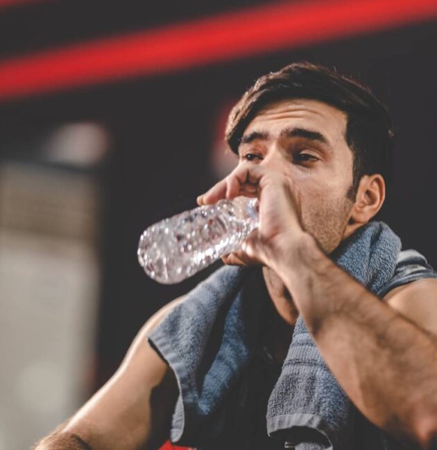 handsome young asian man sitting on modern gym and 2025 04 02 15 52 33 utc 1