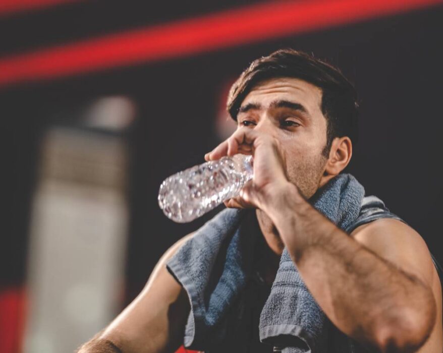 handsome young asian man sitting on modern gym and 2025 04 02 15 52 33 utc 1